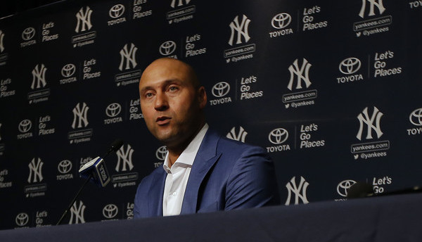 Marlins plan to sell to group that includes Jeter