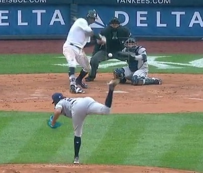 Evan Gattis inadvertently tosses Cory Rasmus' first career strikeout ball  into stands