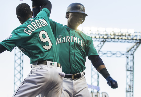 James Paxton in an 80s Mariners uniform.