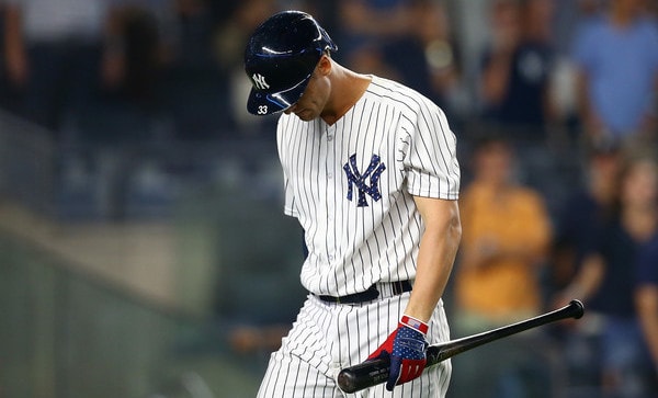 Yankees third string catcher KYLE HIGASHIOKA homers into the second deck in  left field